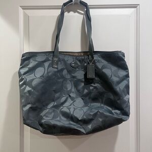 Coach tote with matching toiletry bag